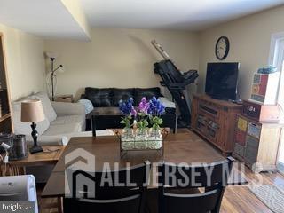 living area featuring wood finished floors