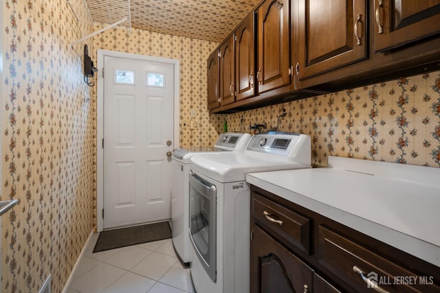 16 Darby Rd, East Brunswick, NJ 08816 - laundry area featuring cabinet space, wallpapered walls, washing machine and dryer, and light tile patterned flooring