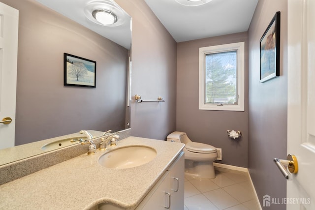 16 Darby Rd, East Brunswick, NJ 08816 - bathroom with tile patterned flooring, toilet, baseboards, and vanity