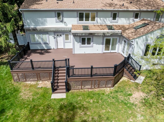 16 Darby Rd, East Brunswick, NJ 08816 - rear view of house featuring stairs, a wooden deck, stucco siding, and a shingled roof