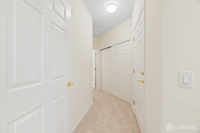 2206 Cedar Village Blvd, East Brunswick, NJ 08816 - hallway with light colored carpet and baseboards
