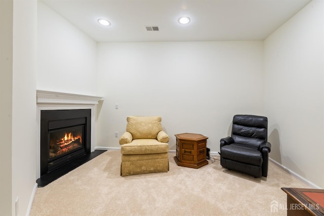 2206 Cedar Village Blvd, East Brunswick, NJ 08816 - living area with carpet flooring, a fireplace with flush hearth, and recessed lighting