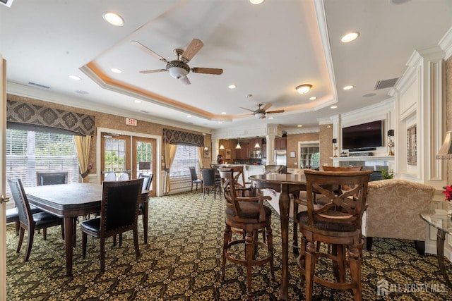 2206 Cedar Village Blvd, East Brunswick, NJ 08816 - dining space with a tray ceiling, a ceiling fan, ornamental molding, dark carpet, and recessed lighting
