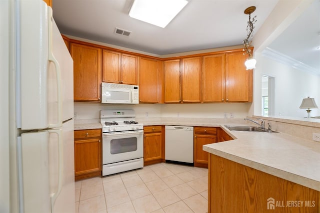 2206 Cedar Village Blvd, East Brunswick, NJ 08816 - kitchen with white appliances, brown cabinetry, light tile patterned flooring, and ornamental molding