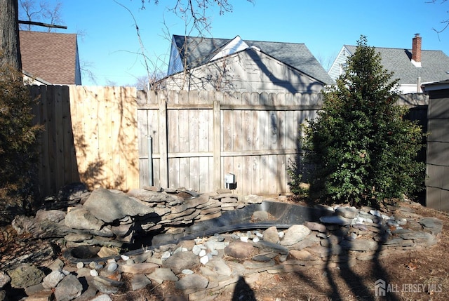 garage featuring fence