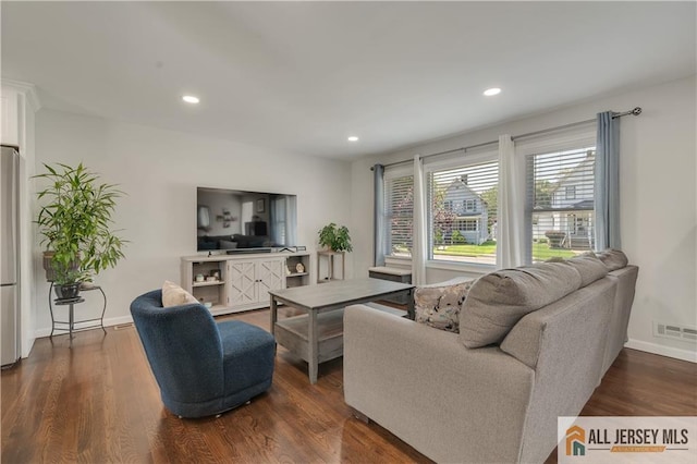 212 Freeman St, Woodbridge Proper, NJ 07095 - living area featuring dark wood-style flooring and recessed lighting