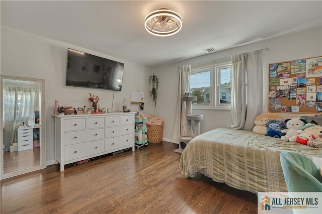 212 Freeman St, Woodbridge Proper, NJ 07095 - bedroom featuring wood finished floors and baseboards