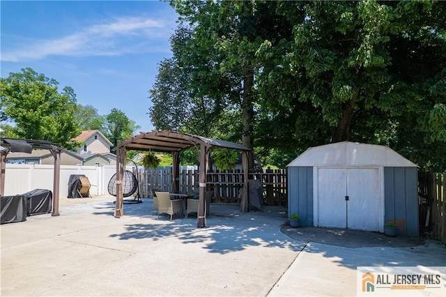 212 Freeman St, Woodbridge Proper, NJ 07095 - fenced backyard with a gazebo, a storage shed, and a patio