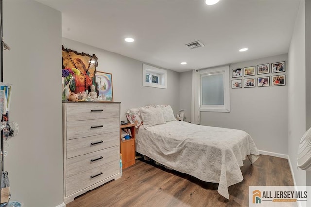 212 Freeman St, Woodbridge Proper, NJ 07095 - bedroom featuring wood finished floors and recessed lighting