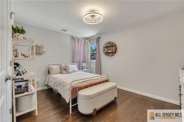 212 Freeman St, Woodbridge Proper, NJ 07095 - bedroom featuring dark wood-type flooring and baseboards