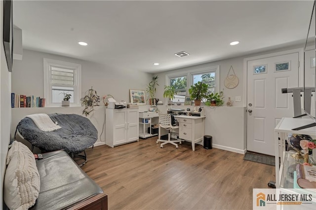 212 Freeman St, Woodbridge Proper, NJ 07095 - home office with wood finished floors and recessed lighting