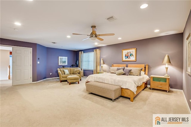 carpeted bedroom with ceiling fan