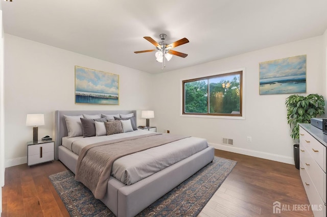 50 Ellen Heath Dr, Matawan, NJ 07747 - bedroom with baseboards, dark wood-style floors, and ceiling fan