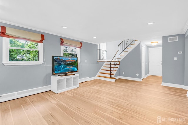 11 Eagle Rd, Edison, NJ 08820 - unfurnished living room featuring stairs, light wood-style floors, ornamental molding, baseboard heating, and recessed lighting