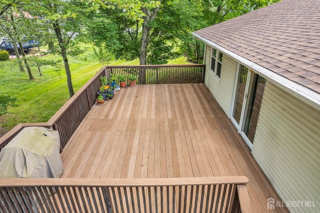 11 Eagle Rd, Edison, NJ 08820 - deck featuring a lawn and view of scattered trees