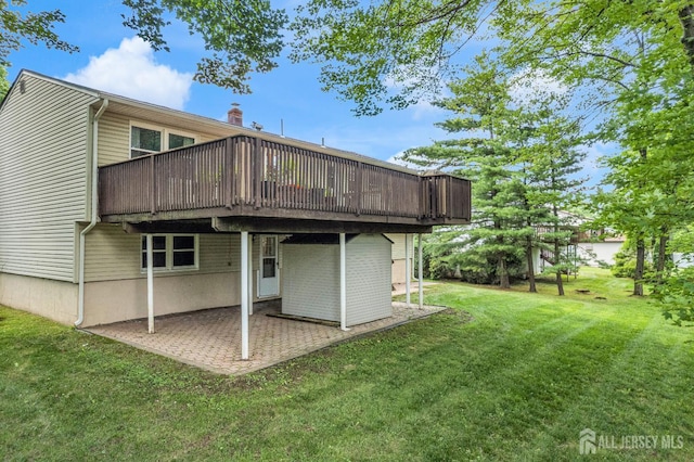 11 Eagle Rd, Edison, NJ 08820 - rear view of house featuring a yard, a patio, and a wooden deck