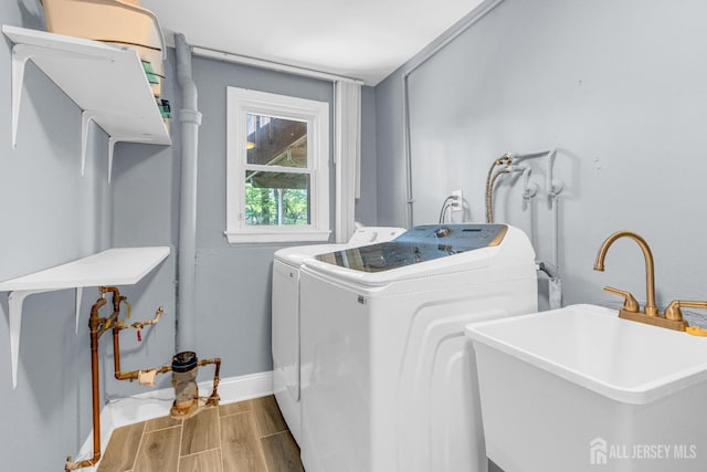 11 Eagle Rd, Edison, NJ 08820 - washroom with washing machine and dryer and wood finished floors