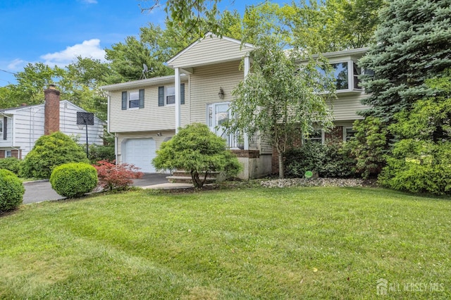 11 Eagle Rd, Edison, NJ 08820 - raised ranch with a garage, a front yard, and driveway