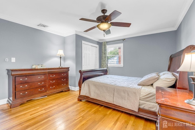 11 Eagle Rd, Edison, NJ 08820 - bedroom featuring light wood finished floors, a closet, ornamental molding, and a ceiling fan