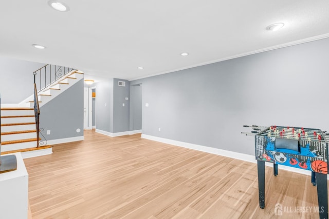 11 Eagle Rd, Edison, NJ 08820 - rec room with light wood-style flooring, recessed lighting, and crown molding