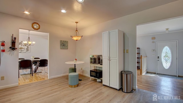 9 Salem Rd, East Brunswick, NJ 08816 - entryway featuring light wood finished floors, baseboards, a chandelier, recessed lighting, and ornamental molding