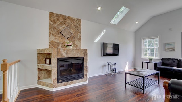 9 Salem Rd, East Brunswick, NJ 08816 - living room featuring dark wood-style flooring, lofted ceiling, a skylight, baseboards, and recessed lighting