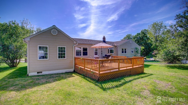 9 Salem Rd, East Brunswick, NJ 08816 - back of property featuring a wooden deck, a lawn, crawl space, and a chimney