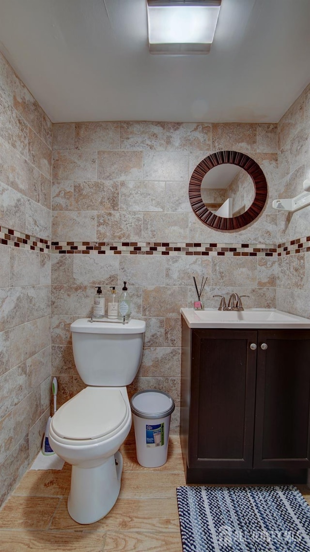 9 Salem Rd, East Brunswick, NJ 08816 - bathroom with vanity, toilet, and tile walls