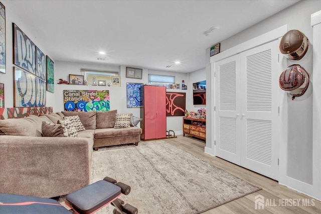 238 Main St, South Amboy, NJ 08879 - living area with wood finished floors, recessed lighting, and baseboards