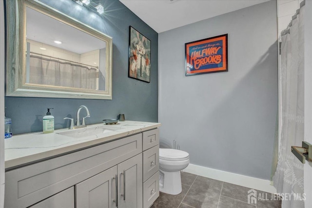 238 Main St, South Amboy, NJ 08879 - full bathroom featuring toilet, baseboards, vanity, and tile patterned floors
