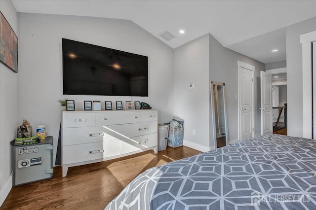 238 Main St, South Amboy, NJ 08879 - bedroom with wood finished floors, lofted ceiling, baseboards, and recessed lighting