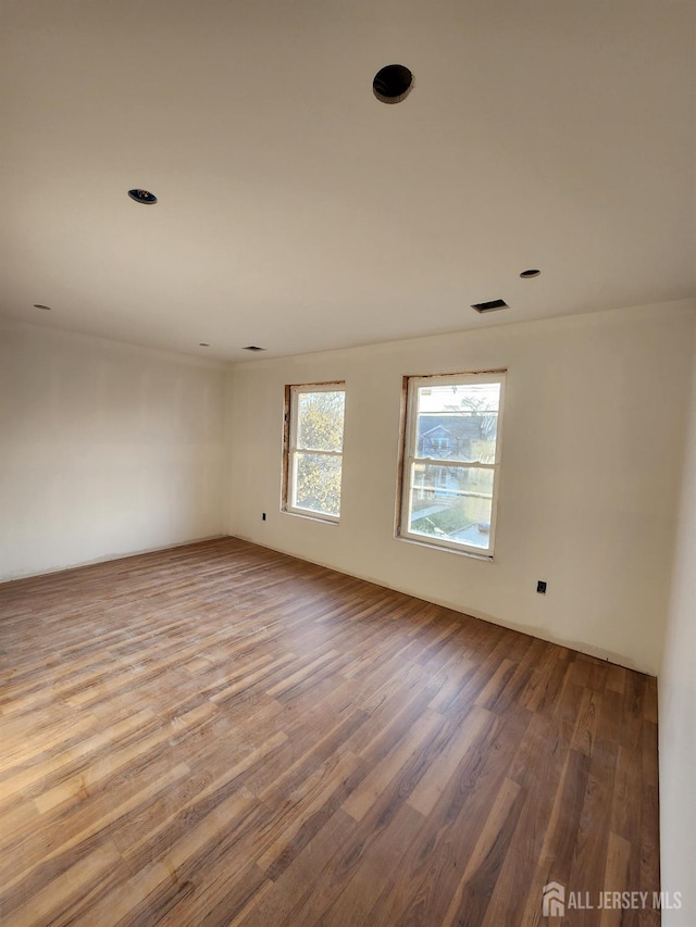 10 Myrtle St, Edison, NJ 08817 - unfurnished room with wood finished floors
