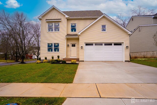 traditional-style house with driveway and a front lawn