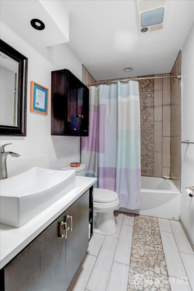 490 Grandin Rd Unit A, Monroe, NJ 08831 - bathroom featuring vanity, shower / bathtub combination with curtain, and toilet