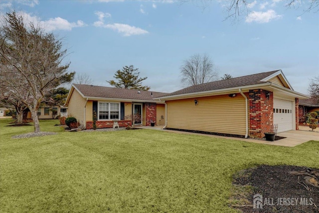 ranch-style home with a front lawn, brick siding, driveway, and an attached garage