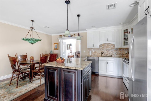 490 Grandin Rd Unit A, Monroe, NJ 08831 - kitchen with visible vents, dark wood-type flooring, white cabinetry, a sink, and stainless steel appliances