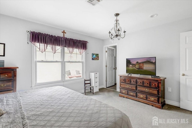490 Grandin Rd Unit A, Monroe, NJ 08831 - carpeted bedroom featuring visible vents, baseboards, and a chandelier