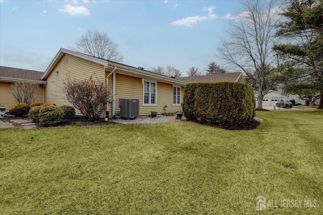 490 Grandin Rd Unit A, Monroe, NJ 08831 - rear view of house featuring central air condition unit and a yard