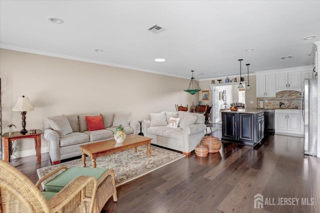 490 Grandin Rd Unit A, Monroe, NJ 08831 - living area featuring ornamental molding, dark wood finished floors, and visible vents