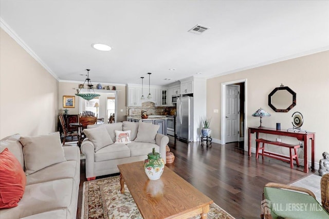 490 Grandin Rd Unit A, Monroe, NJ 08831 - living area with crown molding, visible vents, baseboards, recessed lighting, and dark wood-type flooring