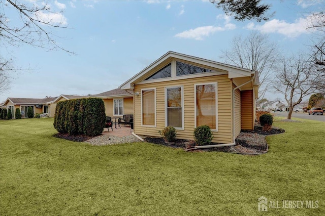 490 Grandin Rd Unit A, Monroe, NJ 08831 - back of property with a lawn and a patio
