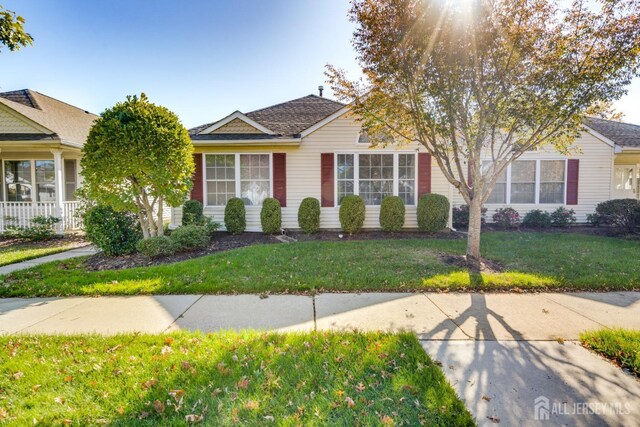 view of front of home with a front yard