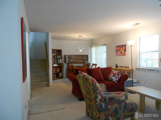 4222 N Bayberry Ct N, South Brunswick, NJ 08852 - living room featuring stairs and carpet flooring