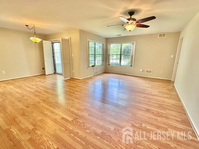 13-B Ashbourne Dr Unit B, Monroe, NJ 08831 - empty room with light wood-style floors and a ceiling fan