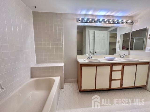 13-B Ashbourne Dr Unit B, Monroe, NJ 08831 - bathroom with tile patterned floors and double vanity