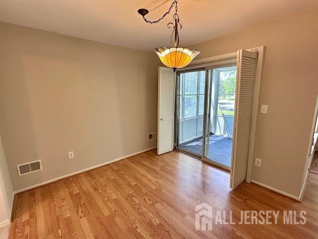 13-B Ashbourne Dr Unit B, Monroe, NJ 08831 - empty room featuring wood finished floors and baseboards