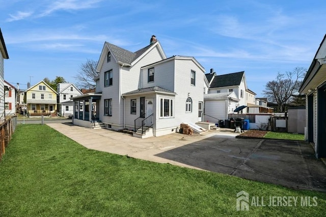 251 Henry St, South Amboy, NJ 08879 - rear view of house with a residential view, entry steps, and a patio area