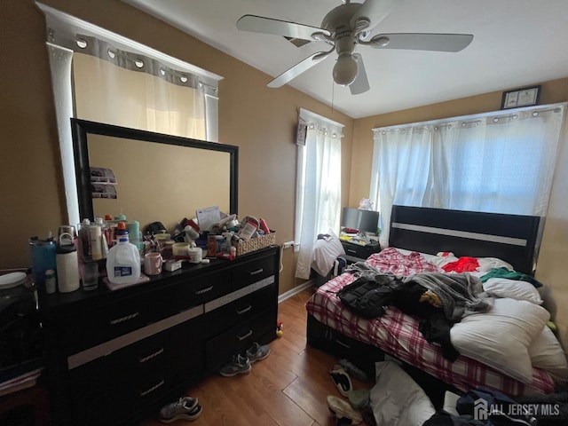 18 Bethany St, New Brunswick, NJ 08901 - bedroom with wood finished floors, ceiling fan, and baseboards