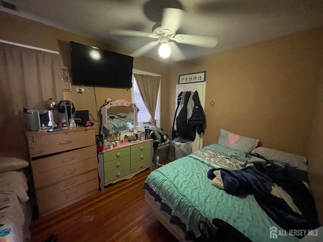 18 Bethany St, New Brunswick, NJ 08901 - bedroom featuring dark wood finished floors and a ceiling fan