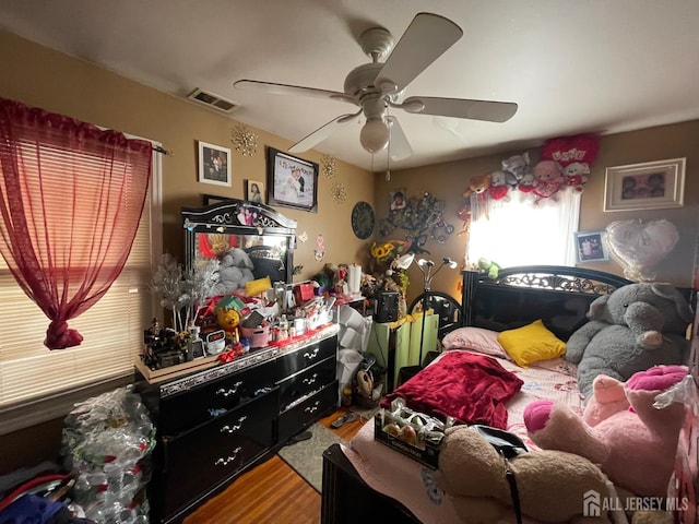 18 Bethany St, New Brunswick, NJ 08901 - bedroom with wood finished floors and a ceiling fan